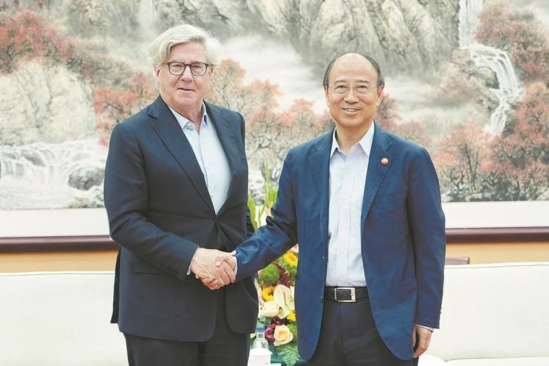 戴厚良会见美国亚洲协会董事会共同主席
