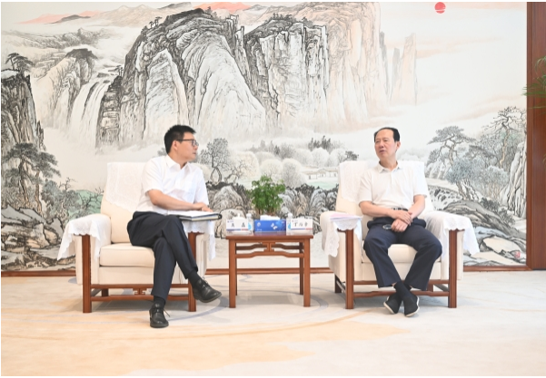 丁焰章与上海电气集团党委书记、董事长吴磊会谈
