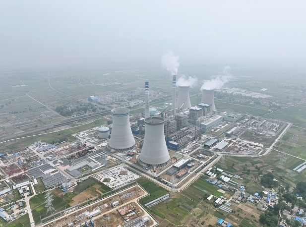 潘集电厂二期2×660MW燃煤机组项目3号冷却塔顺利到顶